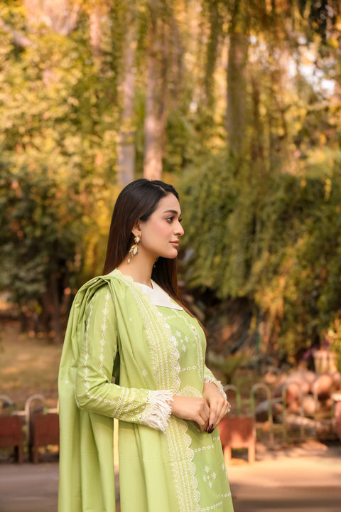 Saadia Ahmed LWSU-25CK301 ChikanKari Lime Green Outfit on a Model in a Serene Outdoor Setting