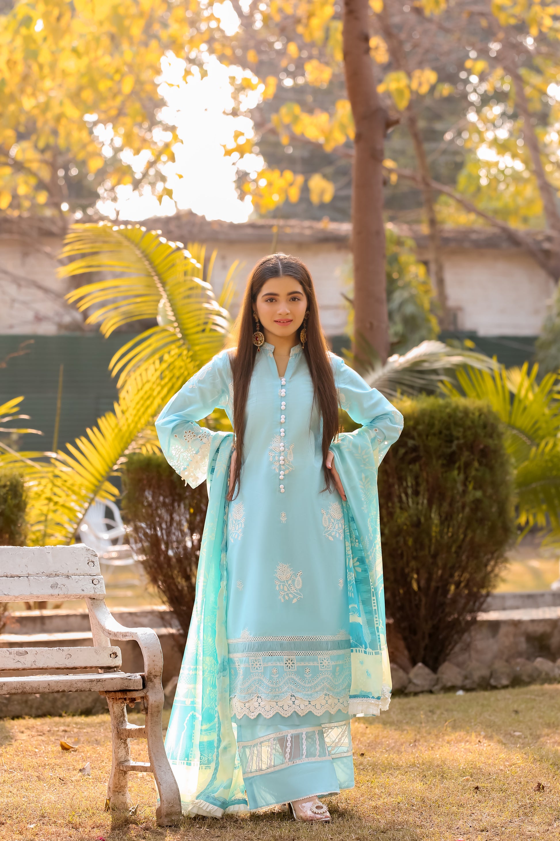 Saadia Ahmed LWSU-25CK305 ChikanKari Blue outfit showcased outdoors with vibrant greenery