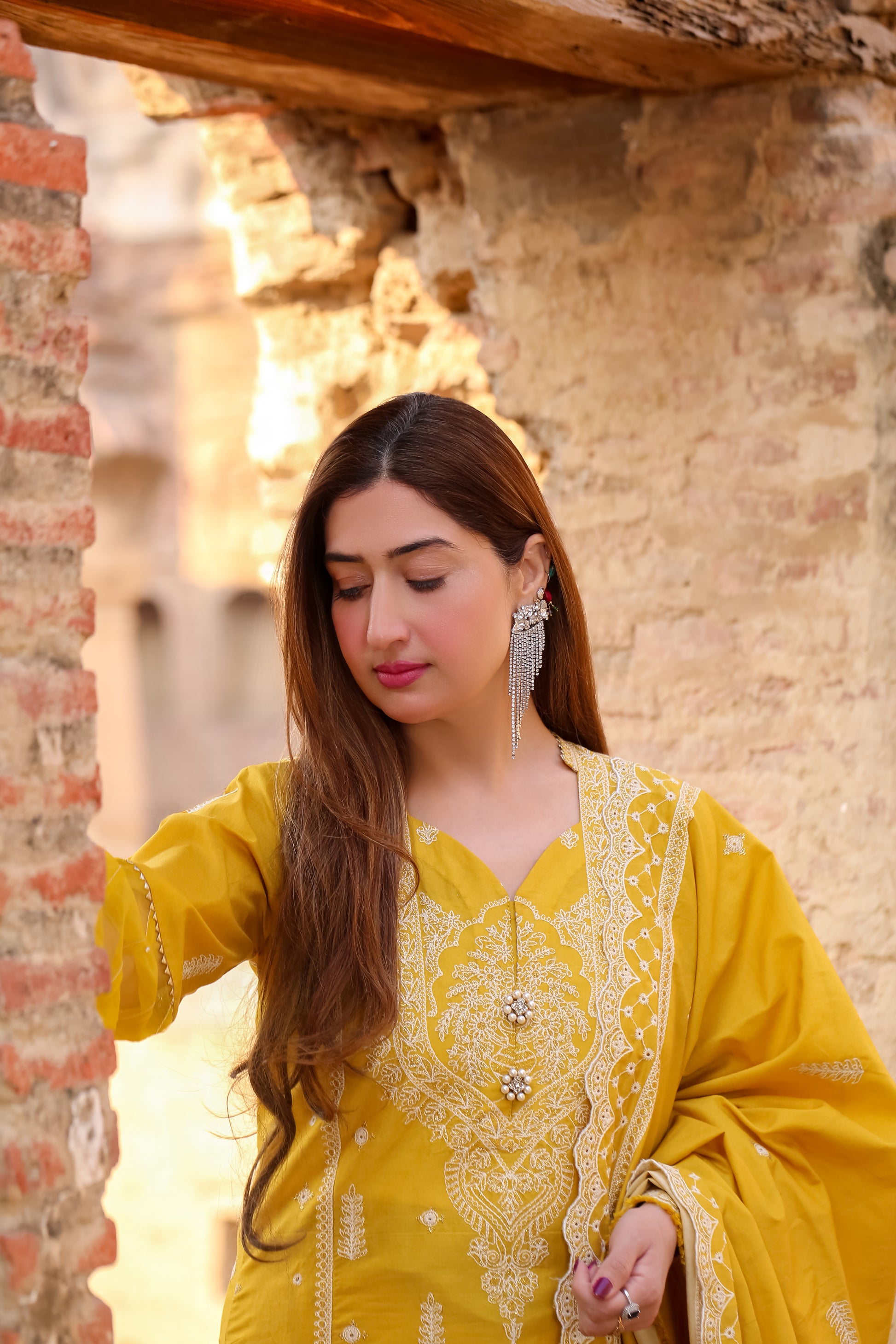 Saadia Ahmed LWSU-25CK306 ChikanKari Mustard Dress with Intricate Embroidery in Natural Setting