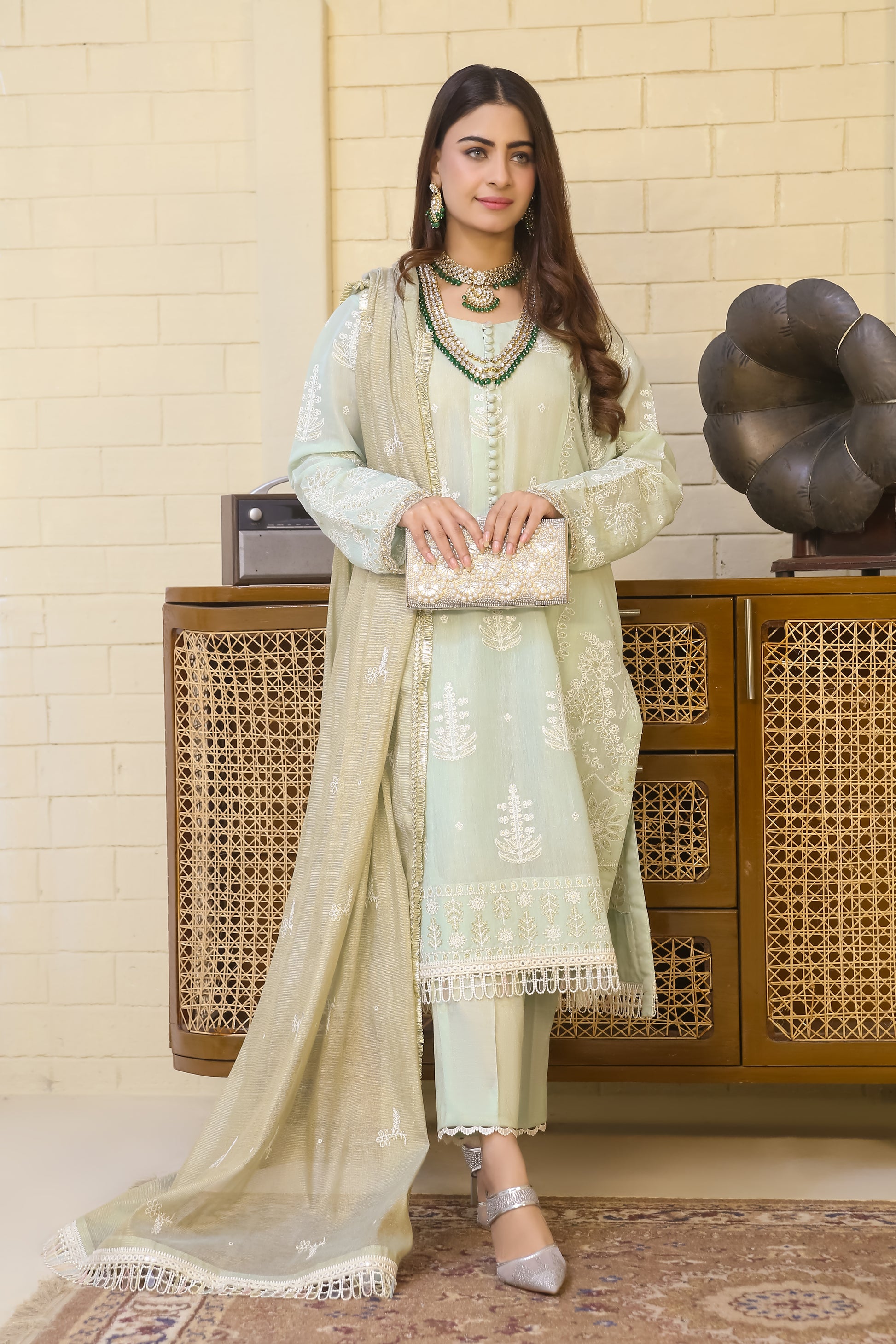 Elegant model in pale green attire featuring Saadia Ahmed LWSU-25FE307 Embroidered Messuri with intricate details