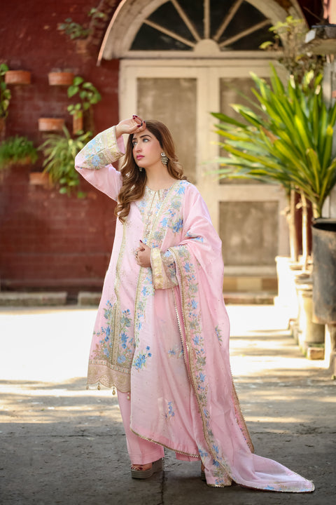 Model wearing Saadia Ahmed LWSU-25FE308 Embroidered Swiss Cotton festive outfit in pink with floral designs