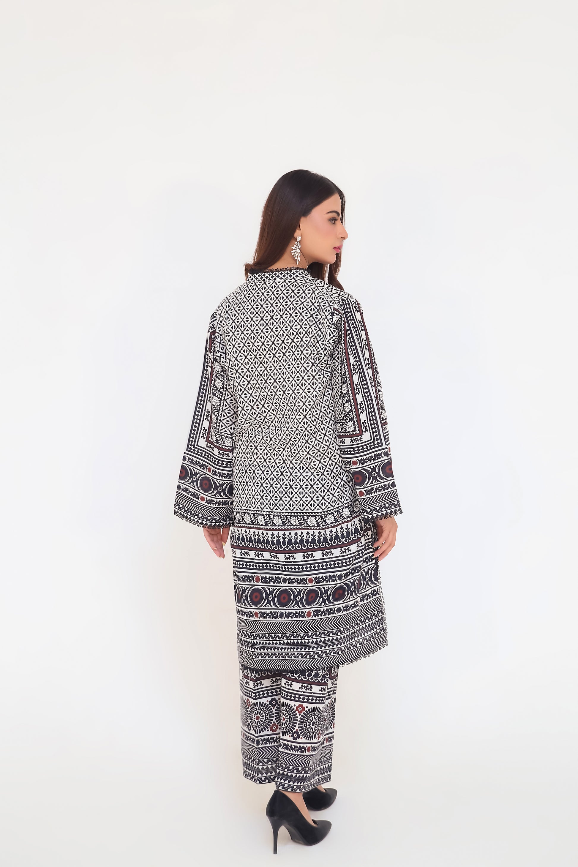Saadia Ahmed LWSU-25P202 2-Pcs Printed Lawn with intricate black and white patterns and elegant flared sleeves