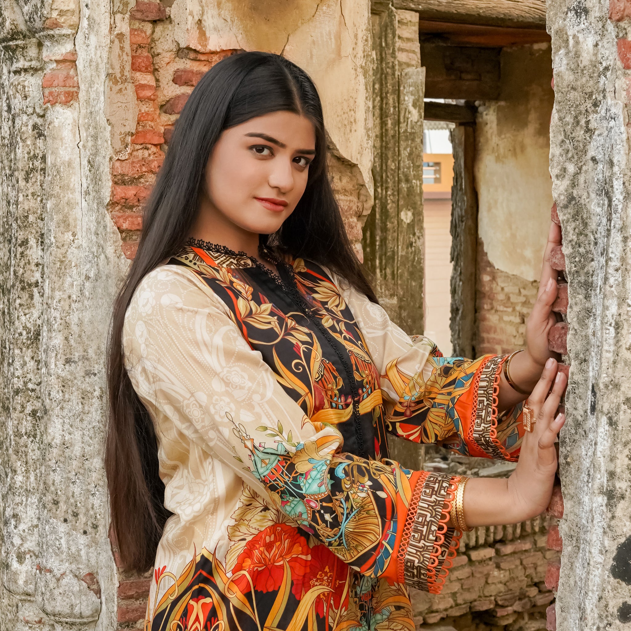 Saadia Ahmed LWSU-25P204 2-Pcs Printed Lawn with Vibrant Floral Design in a Historic Setting