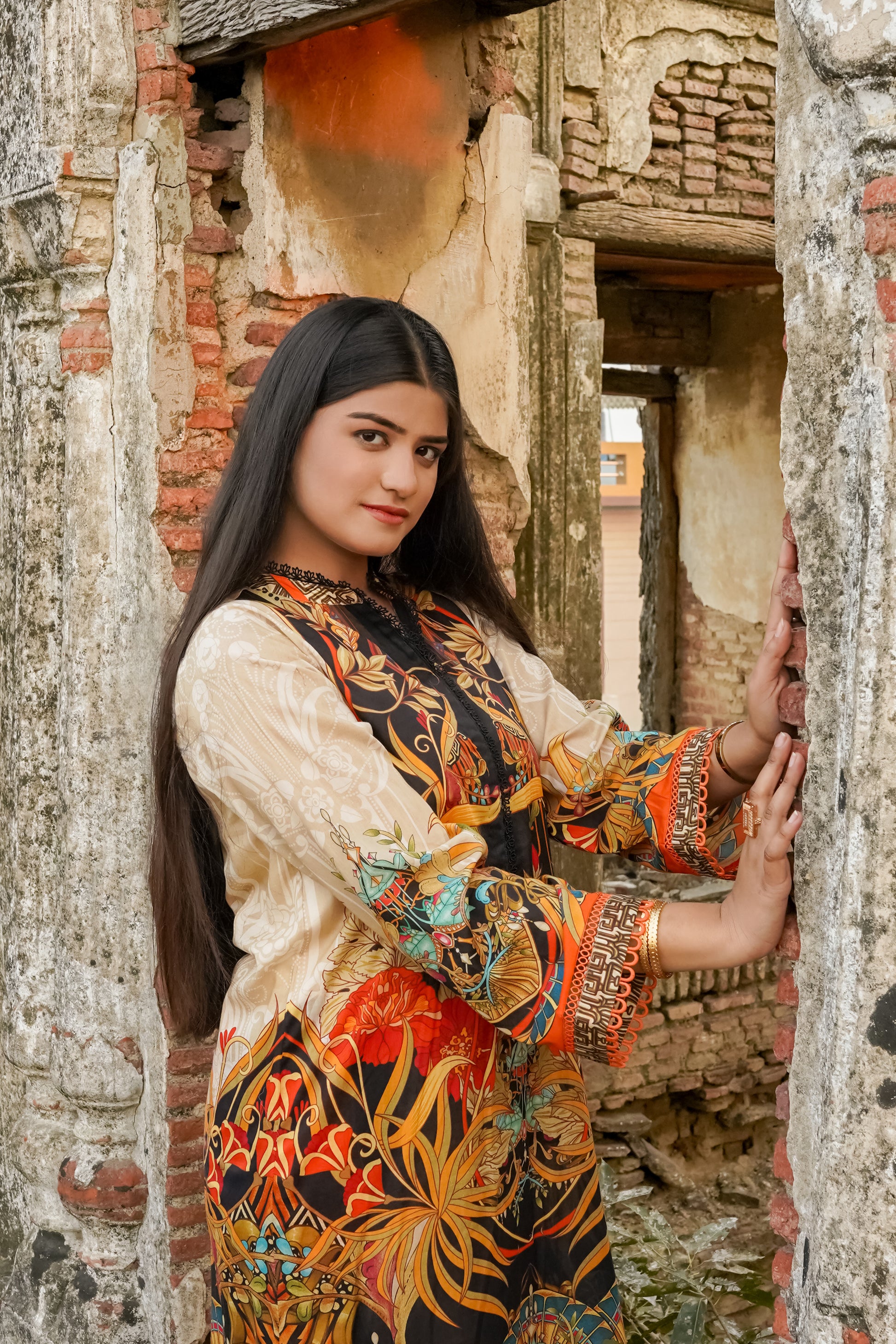 Saadia Ahmed LWSU-25P204 2-Pcs Printed Lawn with Vibrant Floral Design in a Historic Setting